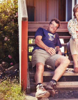 Kim and Eric Crawford from Loveblock wines sitting on some steps