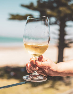 Hand holding a glass of wine