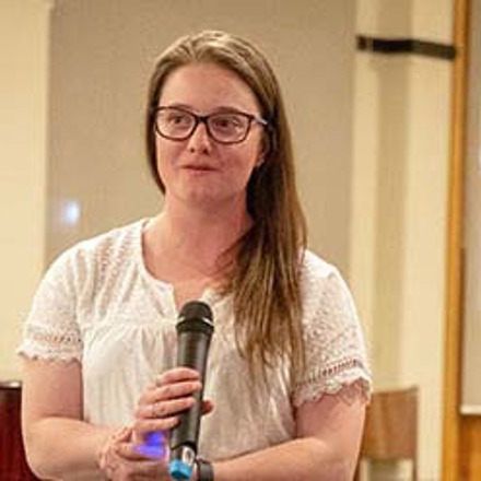 Katarina Jackson holding a microphone