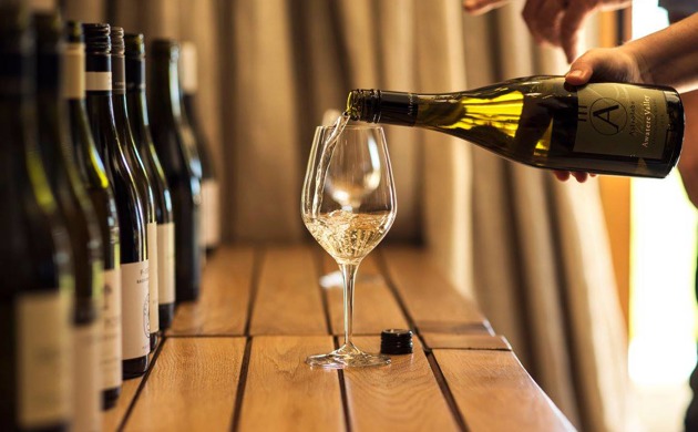 Sauvignon Blanc wine being poured into a glass.