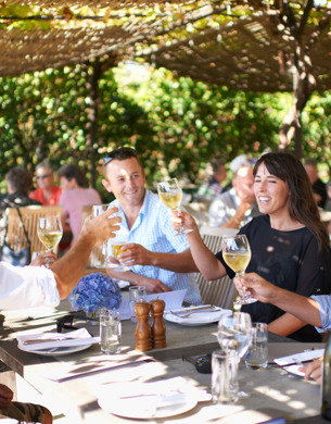 People dining outside at Black Barn