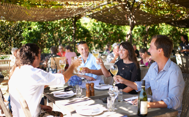 People dining outside at Black Barn