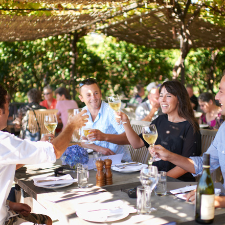 People dining outside at Black Barn